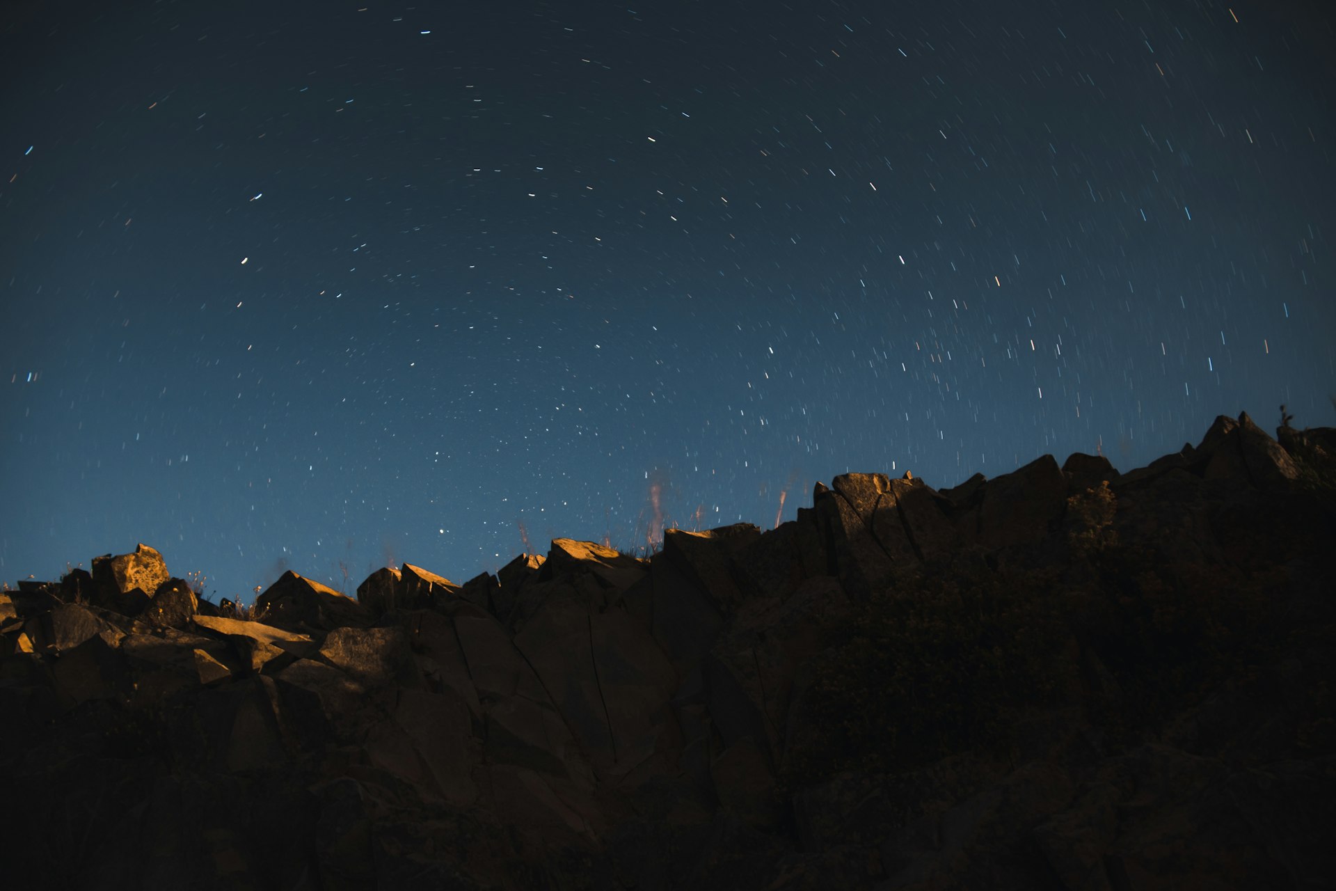 a sky view looking up at the side of a mountain
